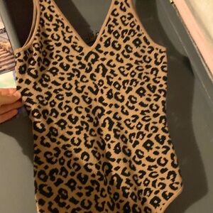 Cheetah print body suit.